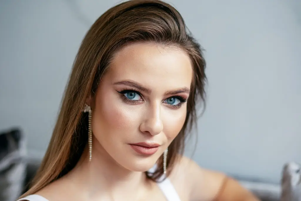 Woman with defined lips and smooth skin, Restylane lip and line treatments at Dulwich Natural Beauty London